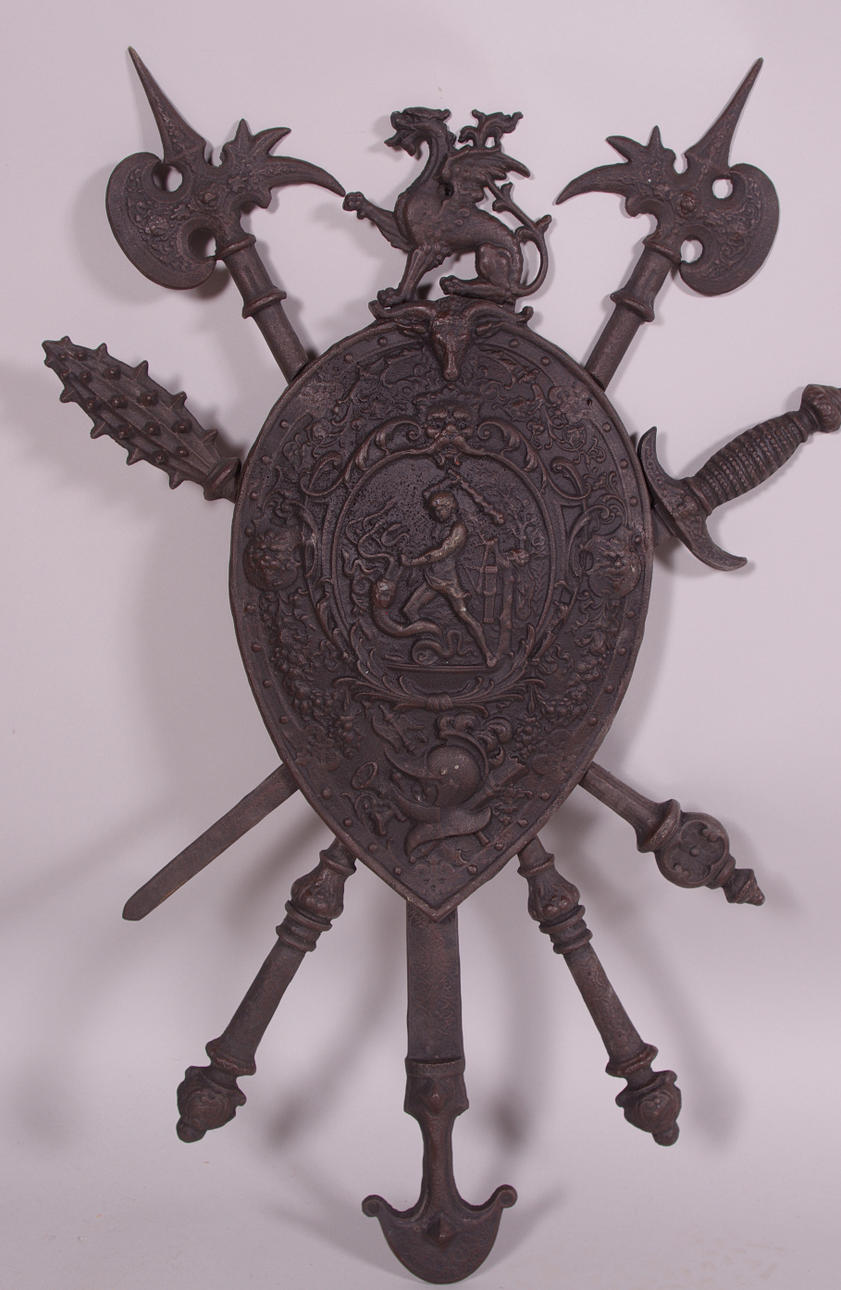 VAPENSKÖLD, gjutjärn, samtida.