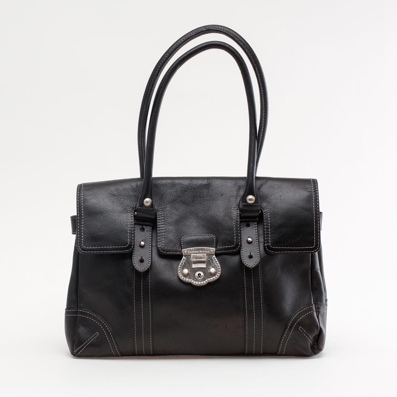 TASKE, Etienne Aigner.