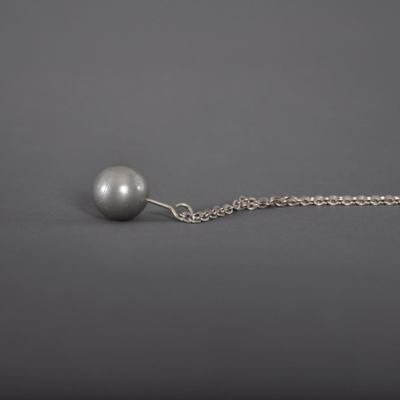 Saamelainen ennustuspallo / heiluri.