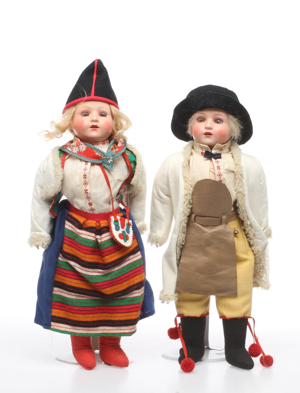 DOCKOR 2 stycken celluloid med tygkropp, märkt sköldpadda, originalkläder.