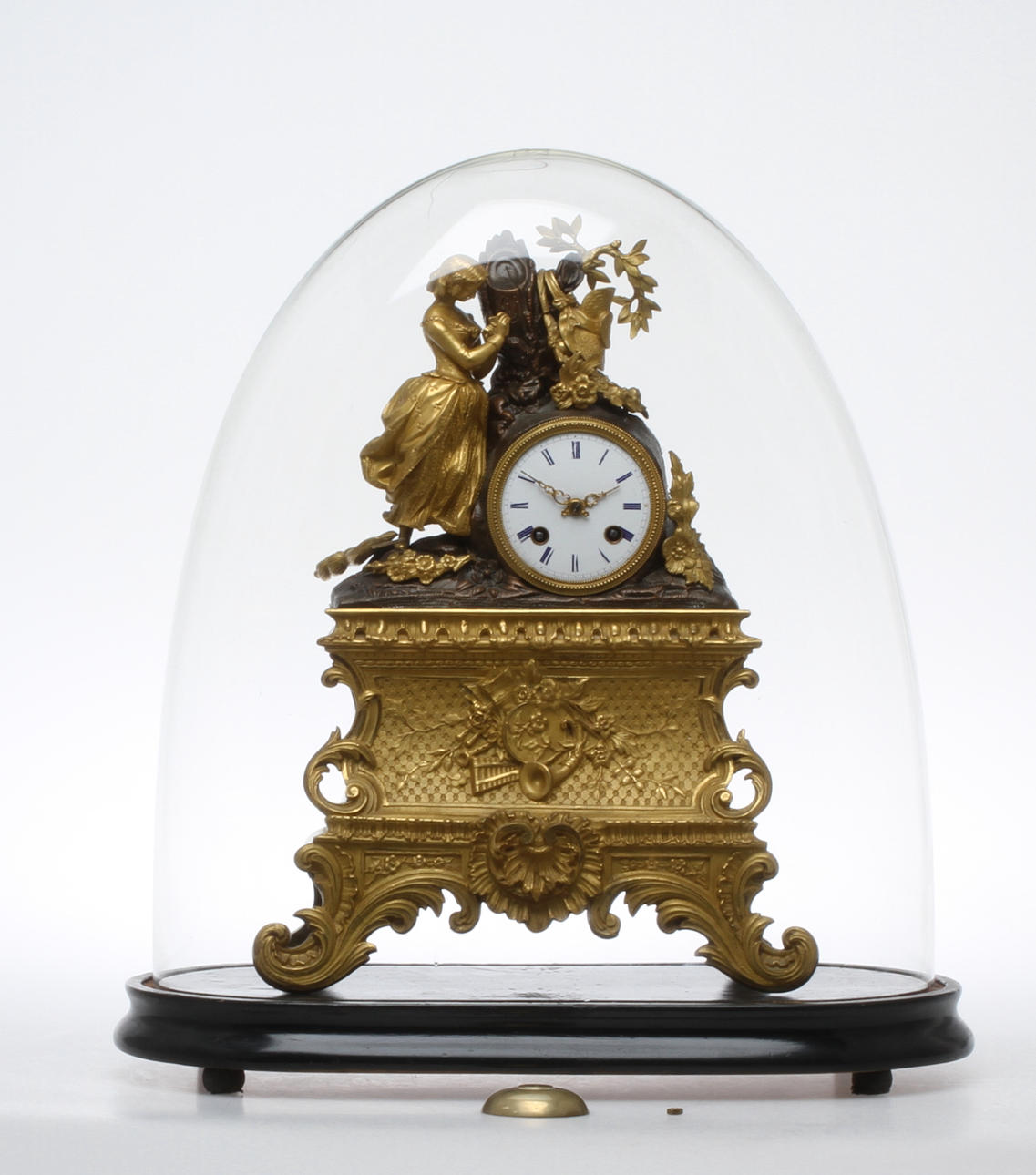 BORDSPENDYL, brons, delvis brännförgylld och patinerad, urverk märkt Medaille d'Or Japy Freres, 1800-talets mitt.