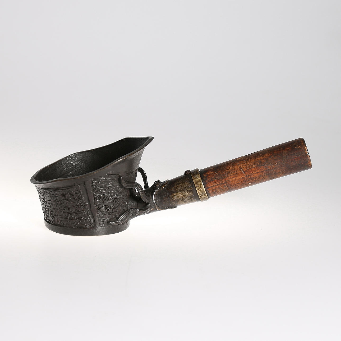 SILKESSTRYKJÄRN, Kina, mässing. 1800-tal.