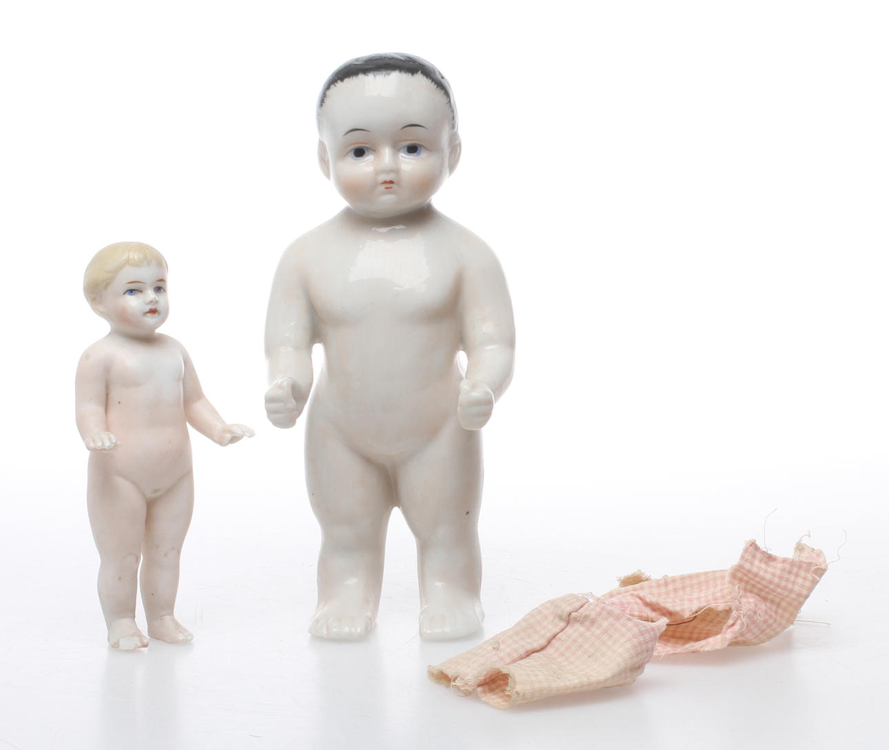 DOCKOR, 2 st, biskvi samt porslin, 1900-talets första kvartal.