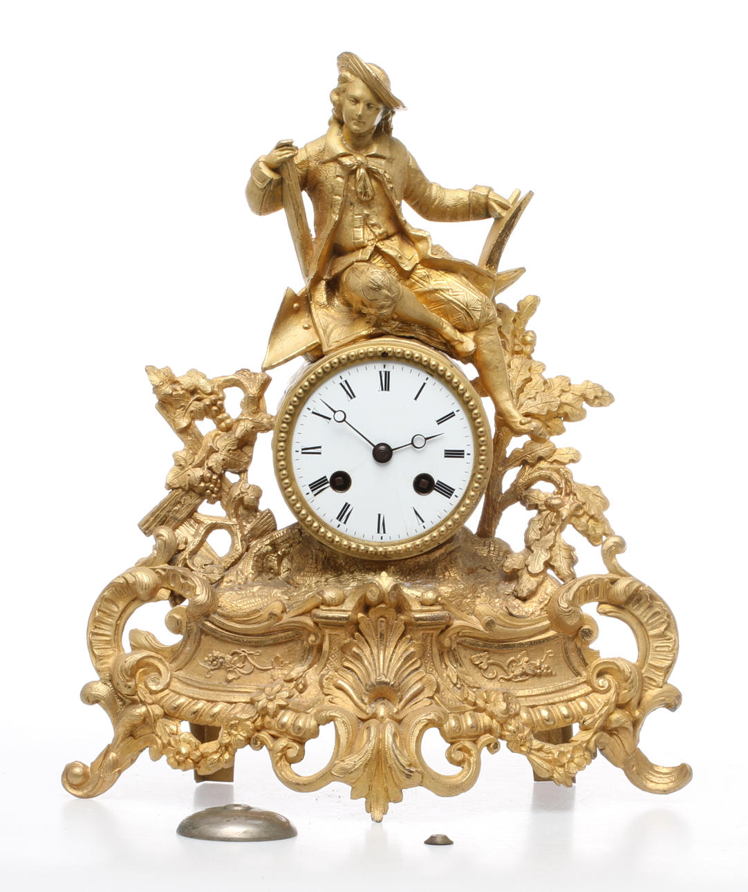 BORDSPENDYL, bronserad och förgylld vitmetall, urverk märkt Medaille de bronze S Marti et Cie, Frankrike, 1800-talets andra hälft.