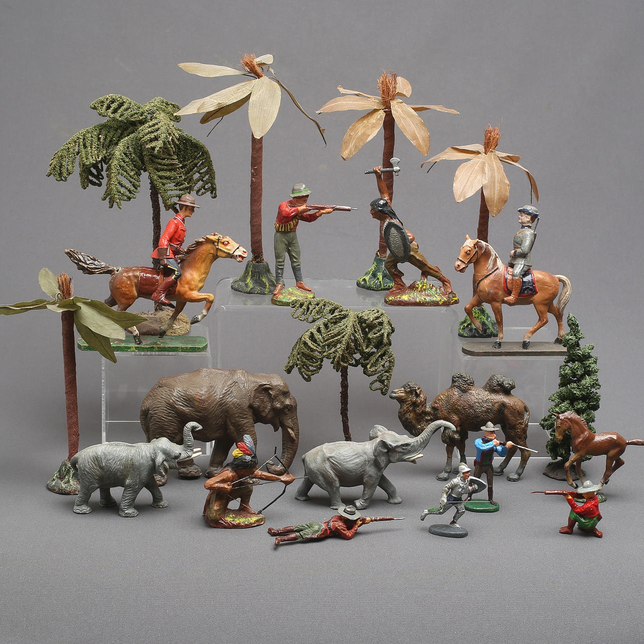ELASTOLIN western figures, knights, mounties, trees and animals.