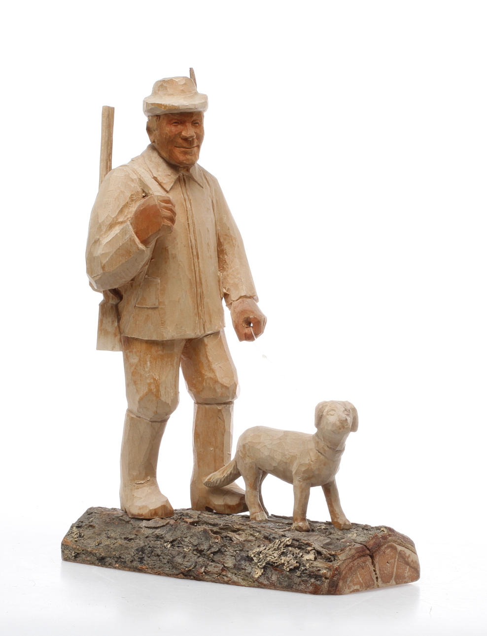 FIGURIN, träskuren, signerad S Husman samt daterad 1972.