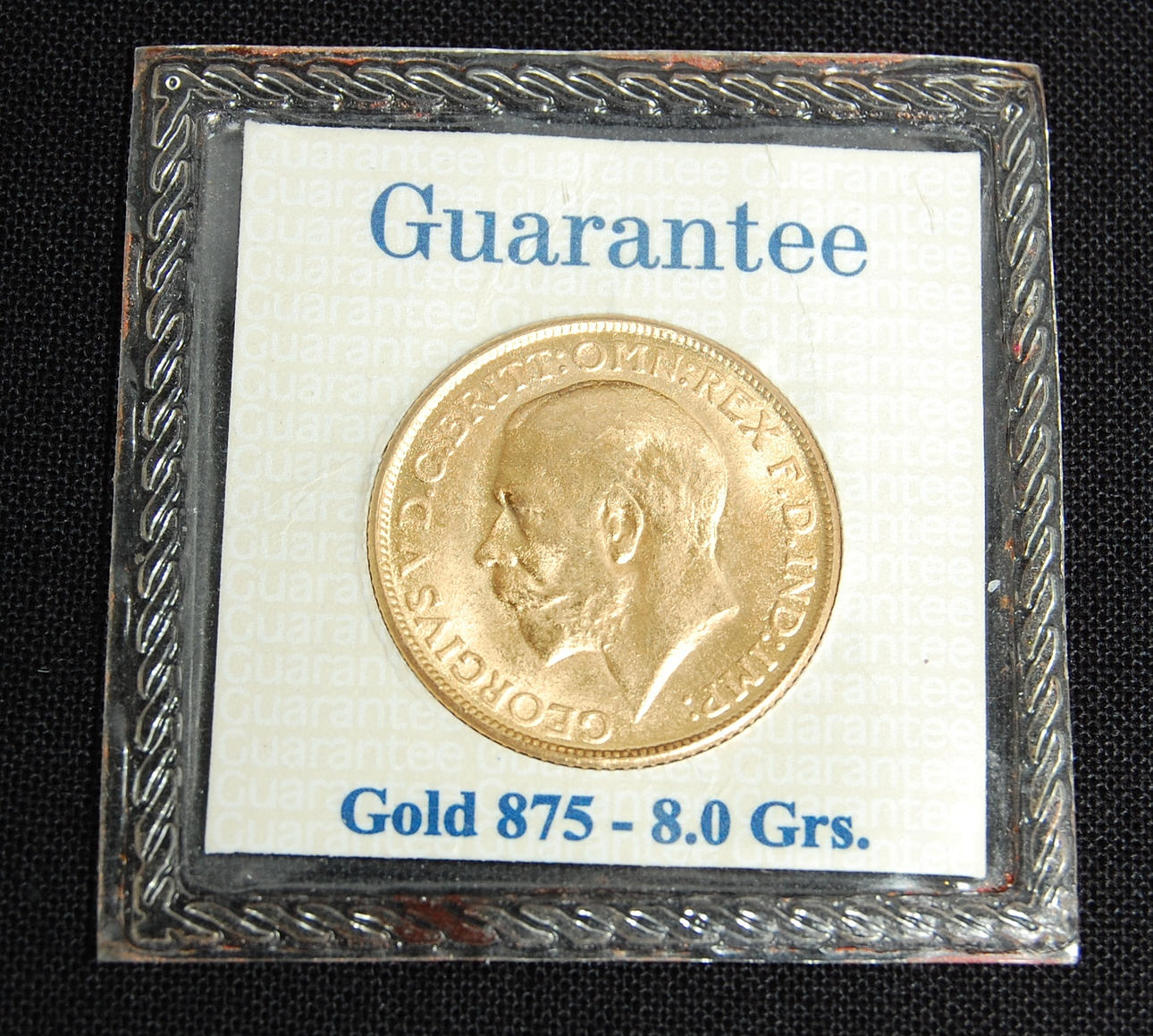 GULDMYNT, 23 K, märkt GEORGIVS VD,G BRITT:OMN:REX F. D IND:IMP ,1931.