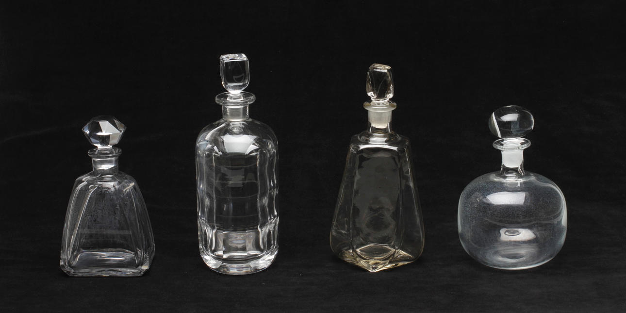 KARAFFER, glas, 4 st, bl.a Orrefors, 1900-tal.