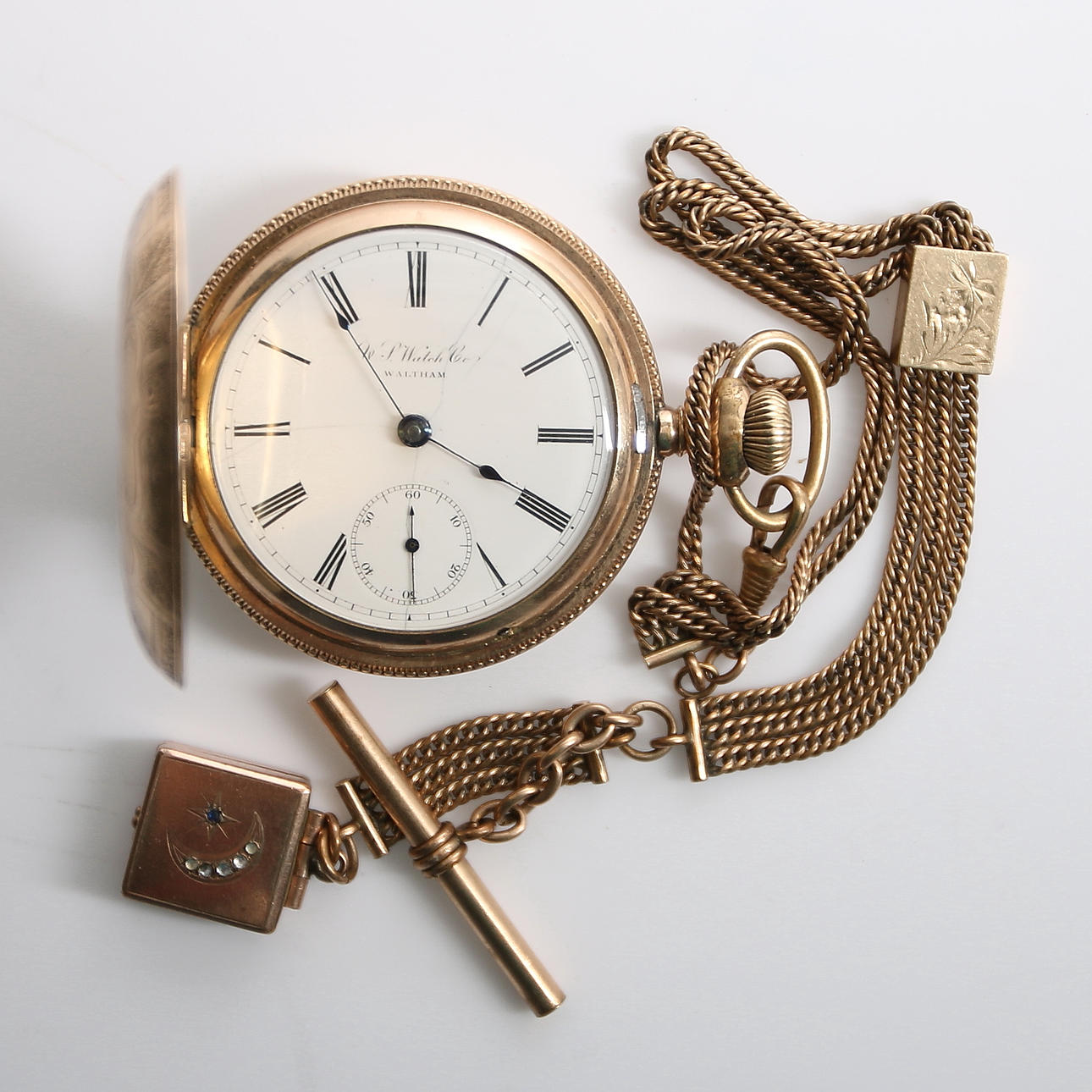 FICKUR med KEDJA, US Watch Co. Waltham, savonett. 1900-talets första del.