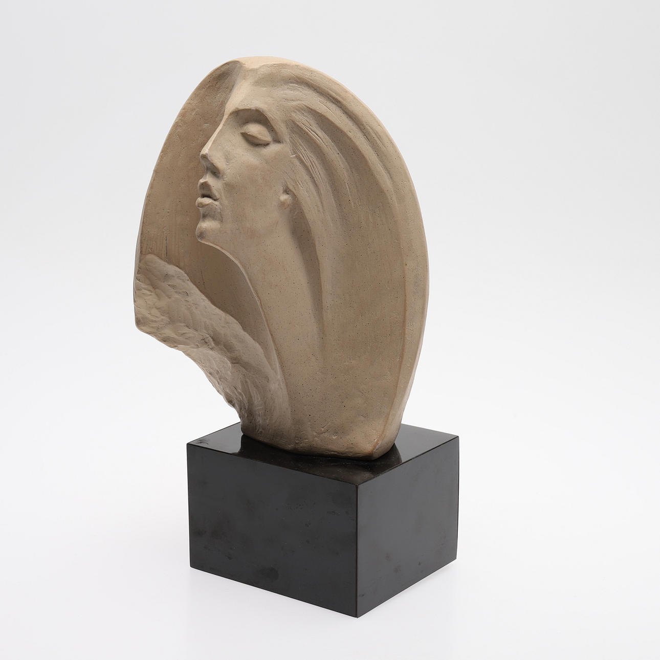 AUSTIN PRODING, KVINNOHUVUD.