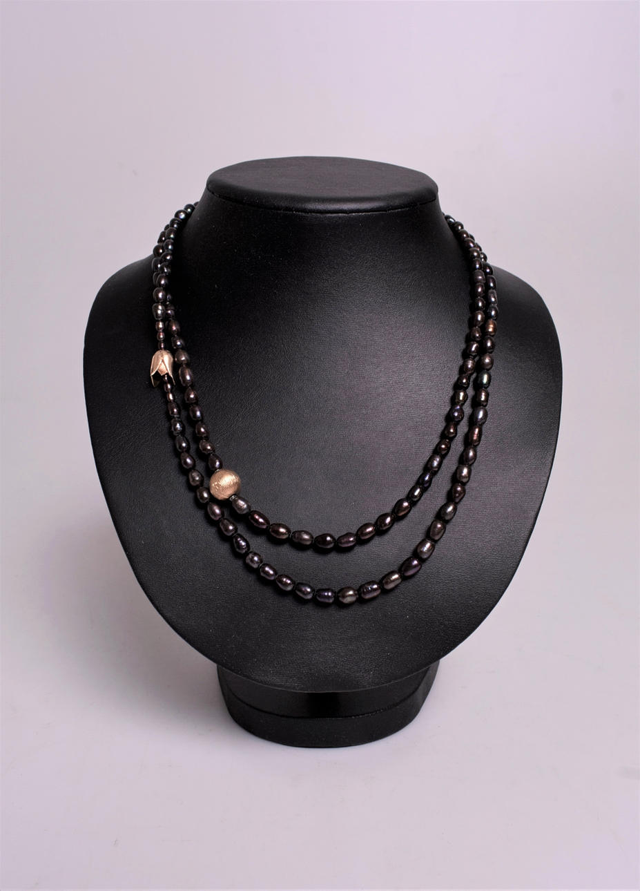 OLE LYNGGAARD. collar, broche, tulipán oro 18k.