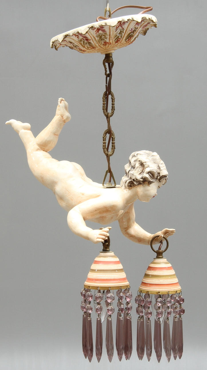 TAKARMATUR, i form av putti, två ljuspunkter, 1900-tal.