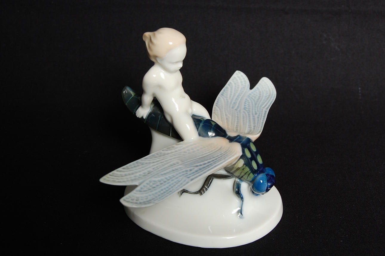 ALBERT  CAASMANN. figurin, porslin, trollslända med gosse, Rosenthal, 1910-20-tal.