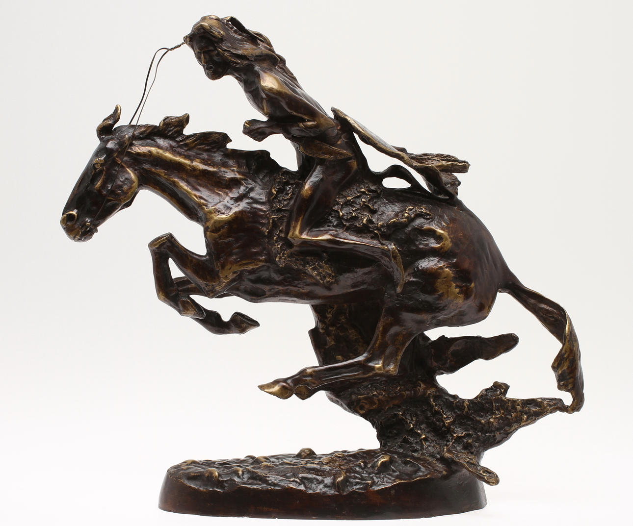 FREDERIC REMINGTON. EFTER. Cheyenne, brons, signerad i gjutningen.