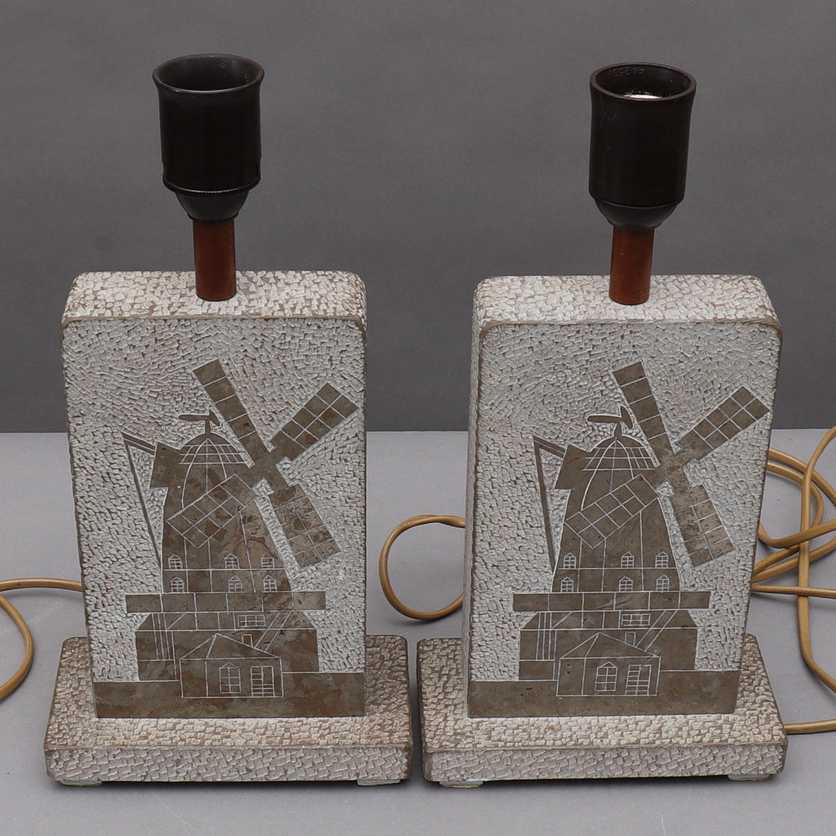 TABLE LAMPS, a pair, Öland limestone, windmill motif, signed JP.