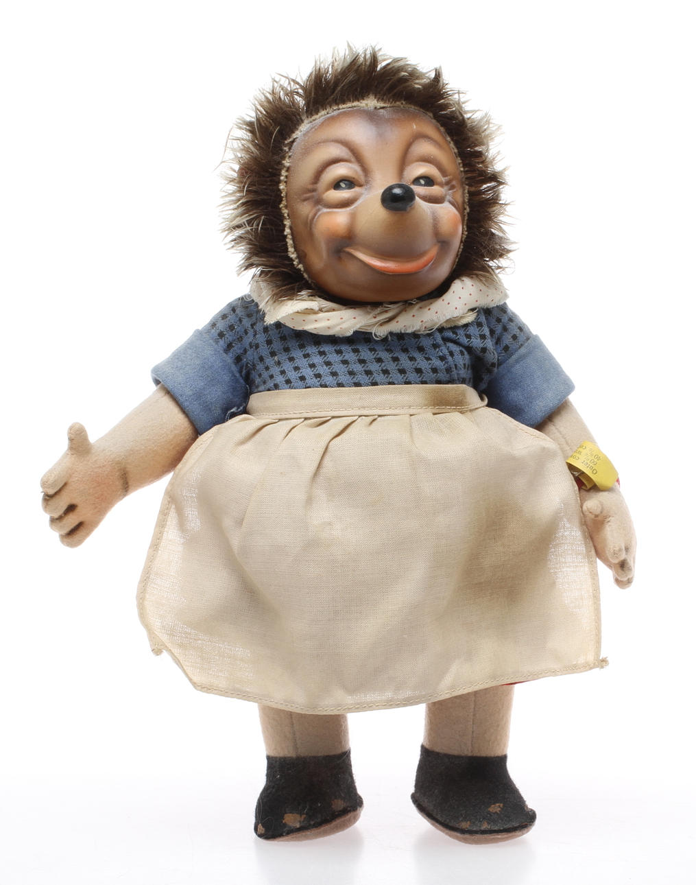 STEIFF MECKI, Fru MICKI, knapp med flagga på armband vänster hand.