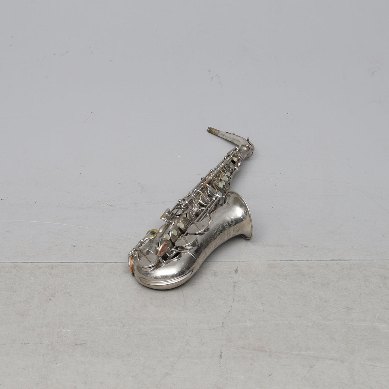 SAXOPHONE, marked Toneking.