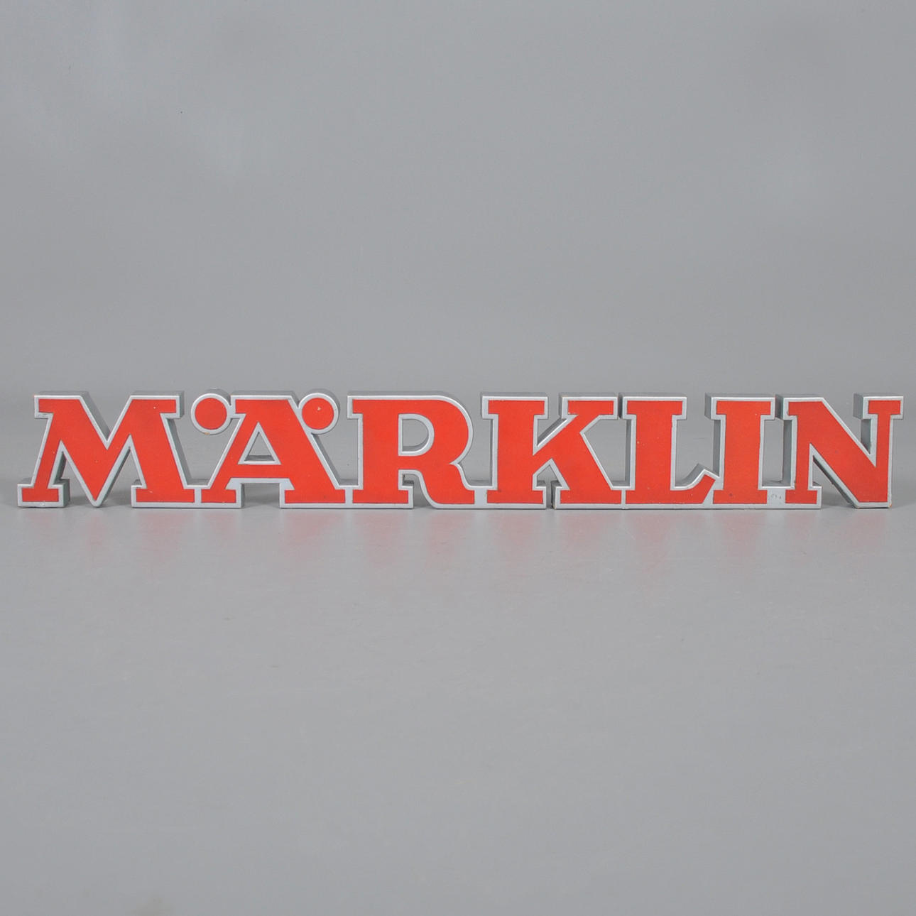 MÄRKLIN, butiksskilt.