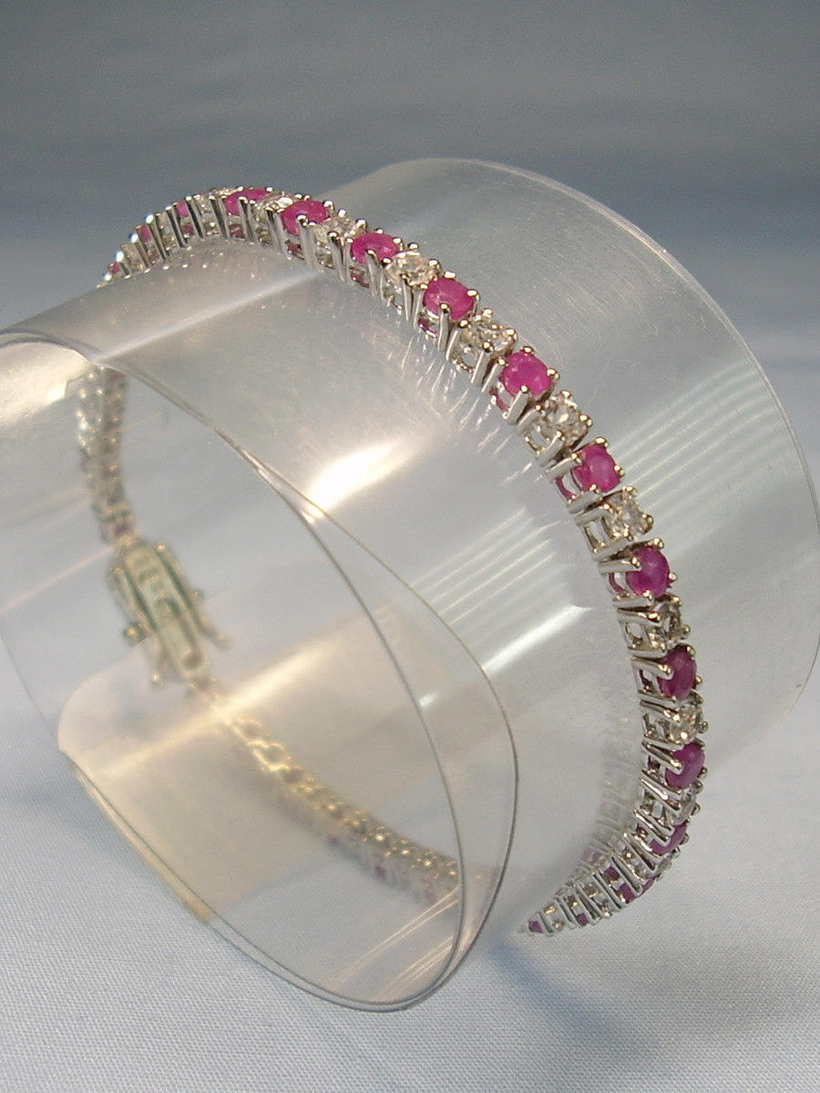 RUBÍ - TOPACIO BLANCO PULSERA RIVIERE PLATA HARRY IVENS.