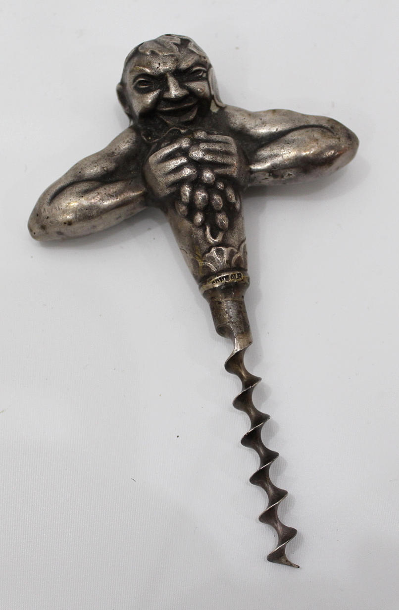 KORKSKRUV i form av en gubbe, nysilver.