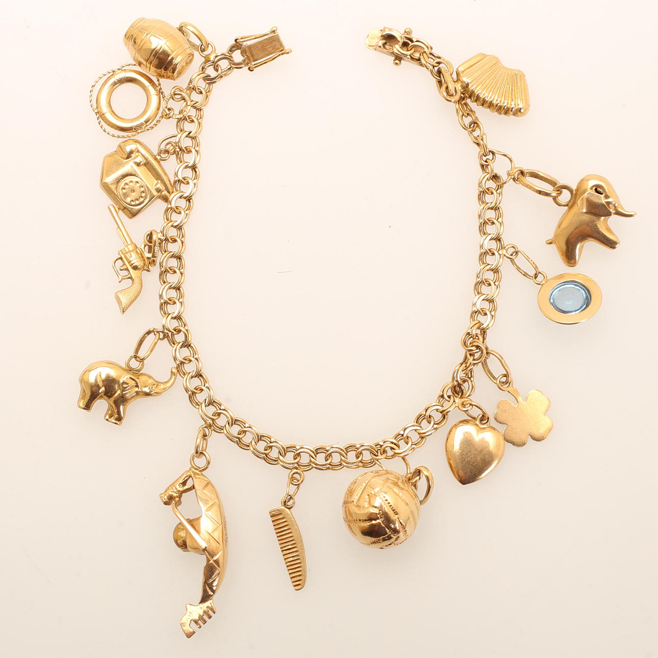 ARMBAND med belocker, 18k guld.