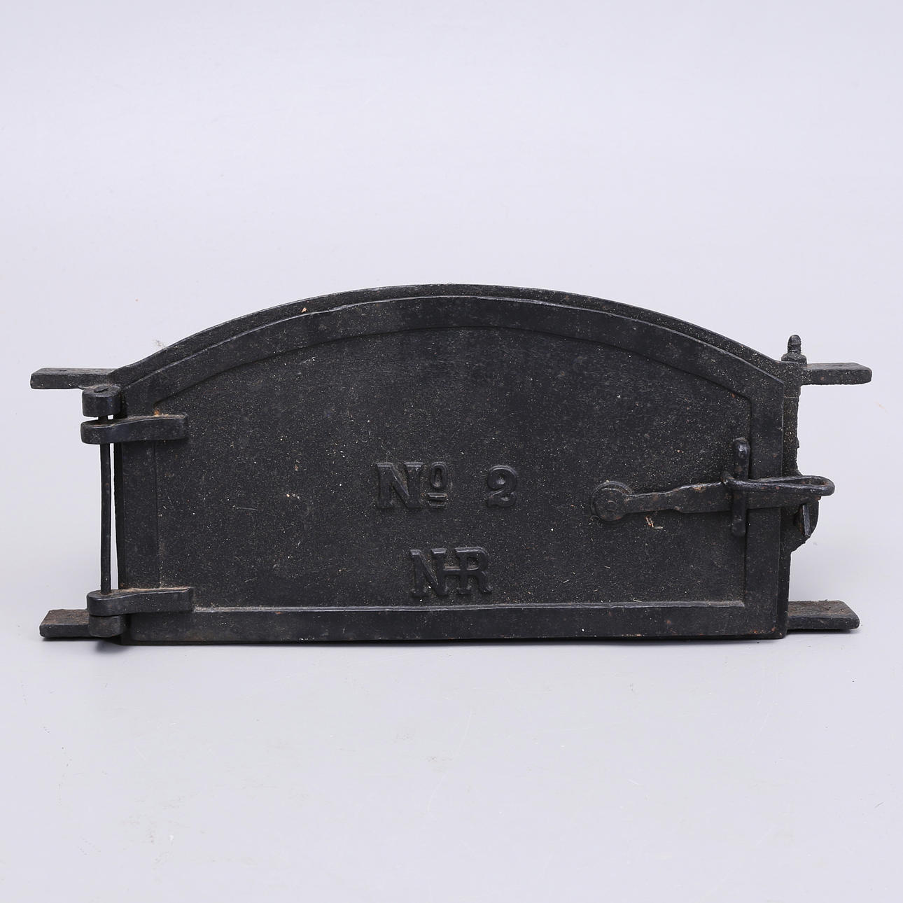 UGNSLUCKA, gjutjärn, märkt no 2 NHR.