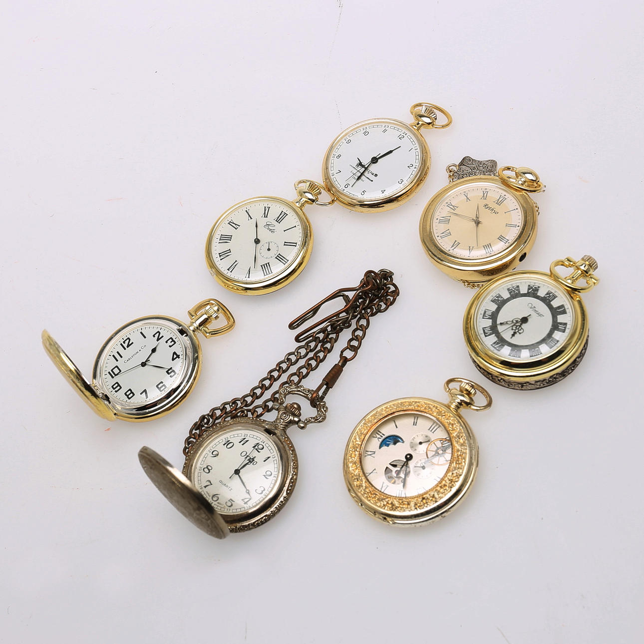 TASCHENUHR, 7 Stück, darunter Origo.