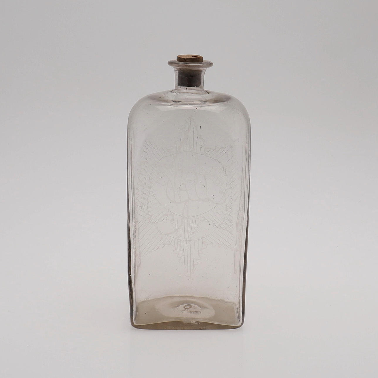 BOTTLE, PROBABLY GLUED, AROUND THE YEAR 1800.