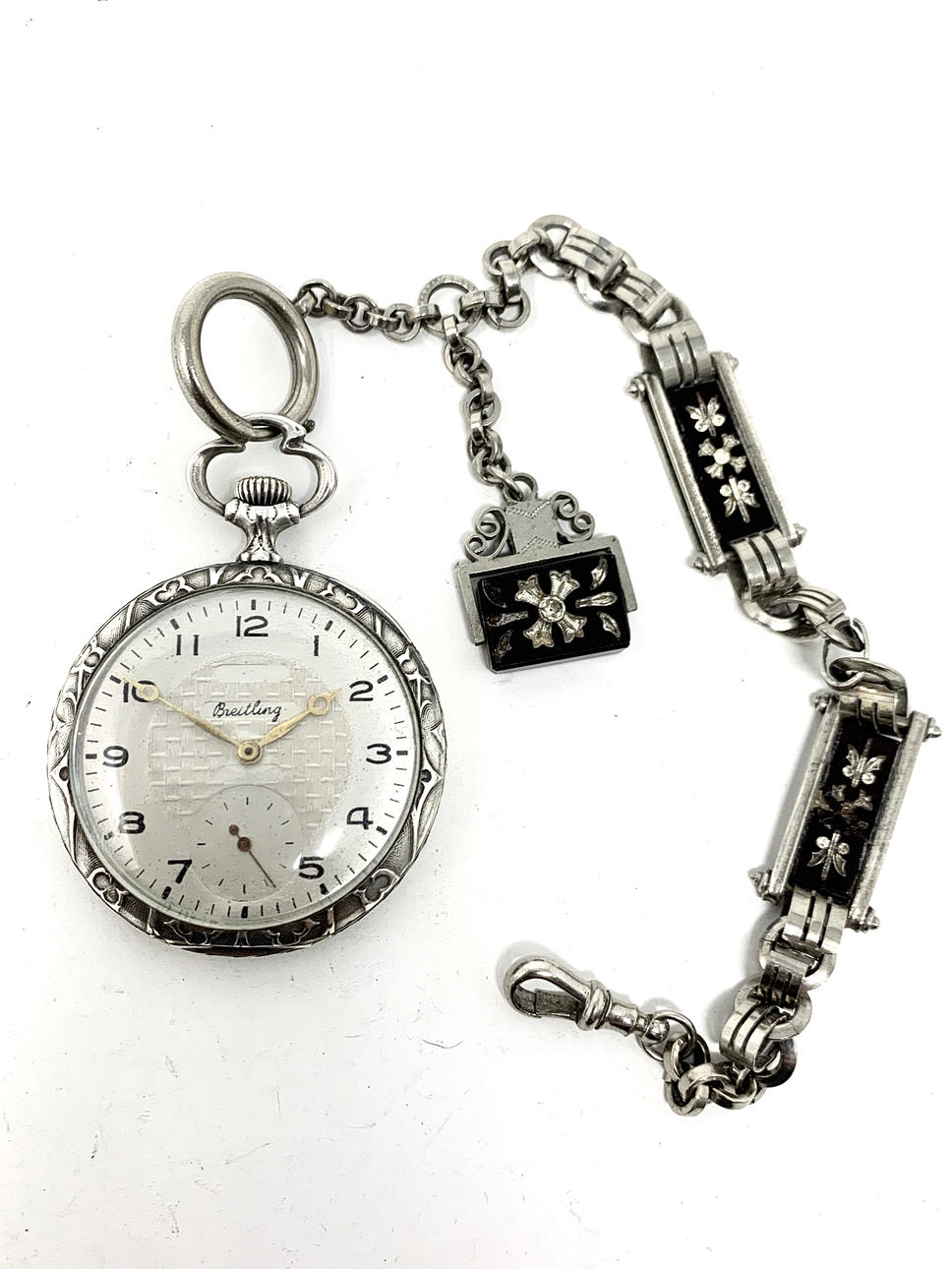 Reloj bolsillo Breitling con chatelaine.
