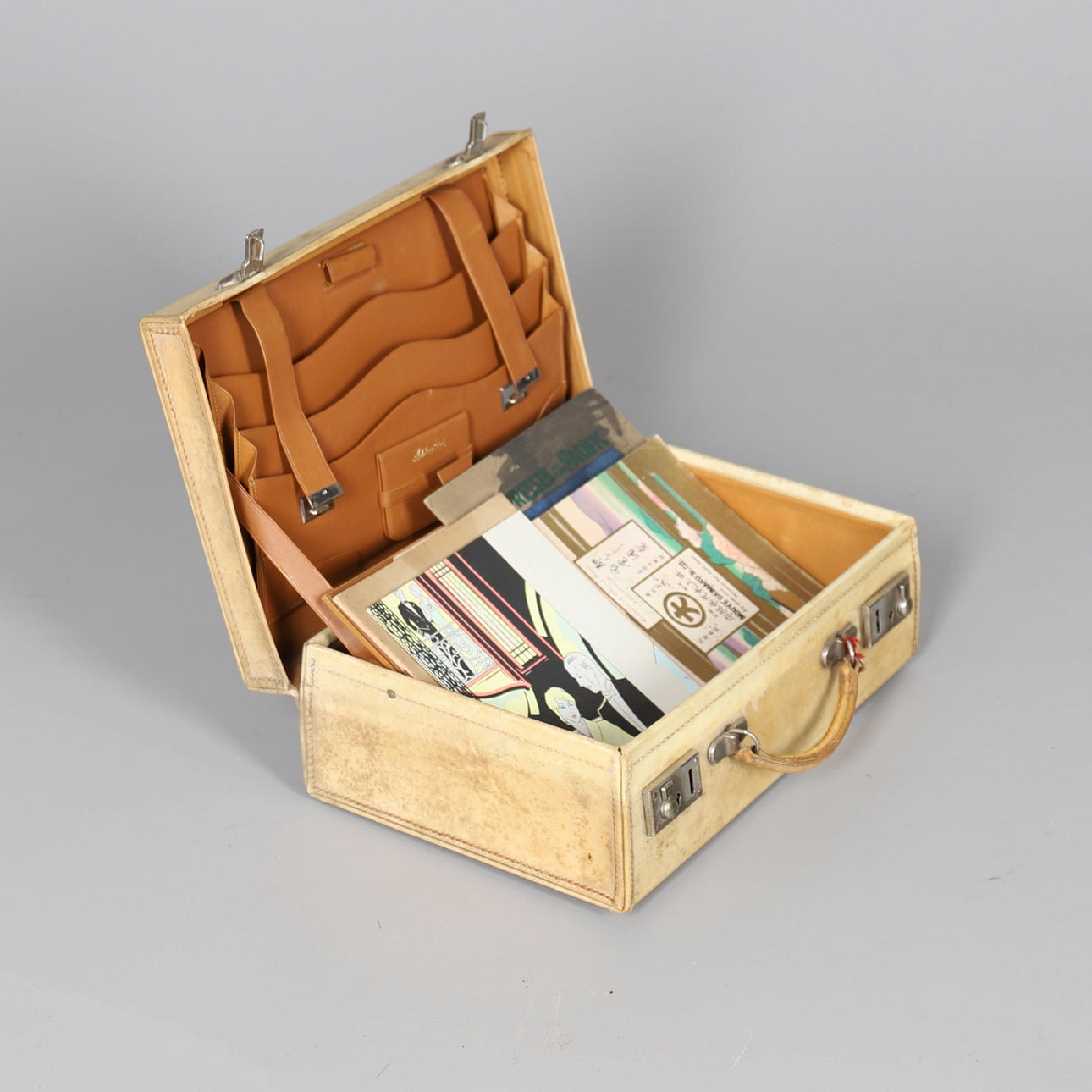 A VINTAGE VELLUM WRITING CASE.