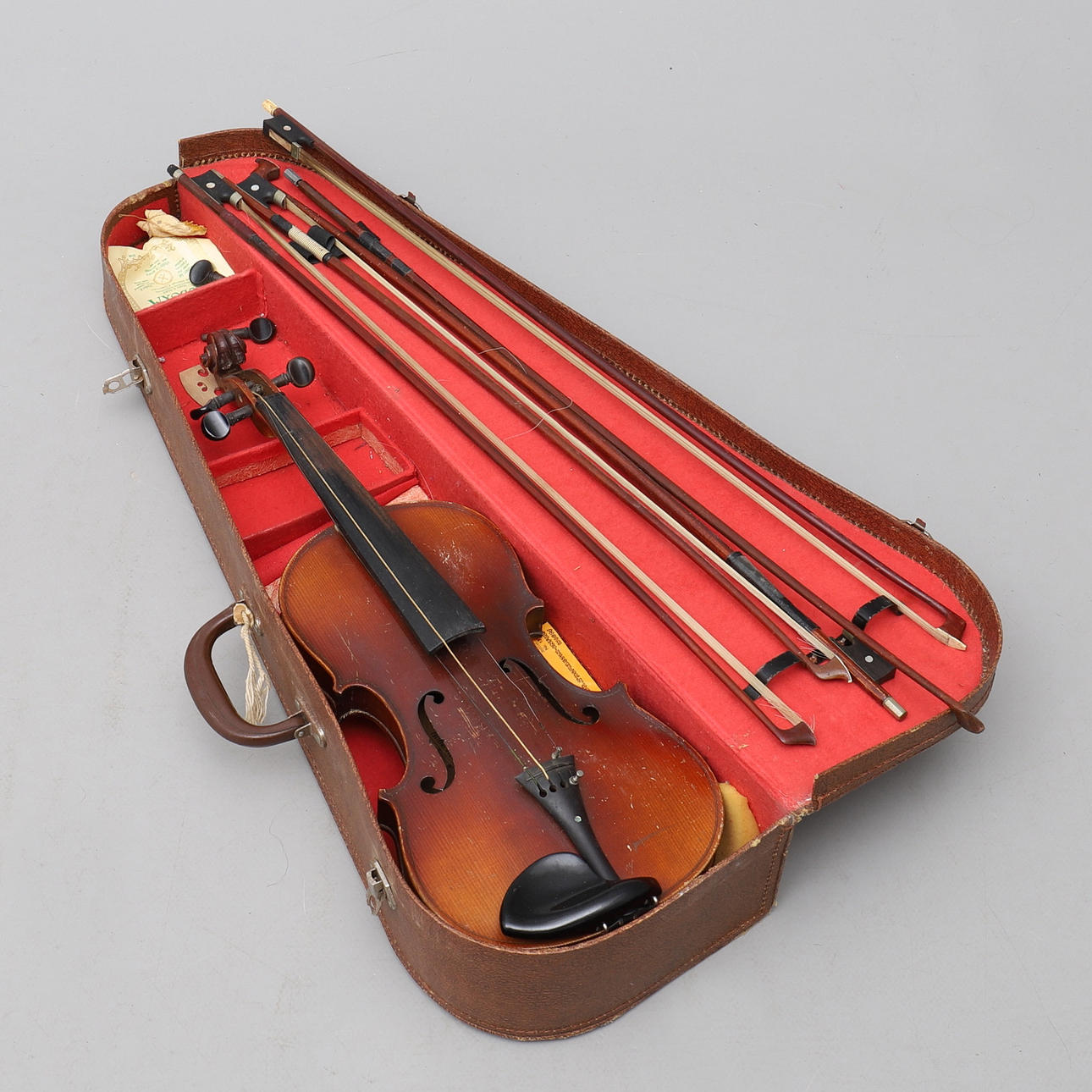 VIOLIN AND FOUR STRINGS.