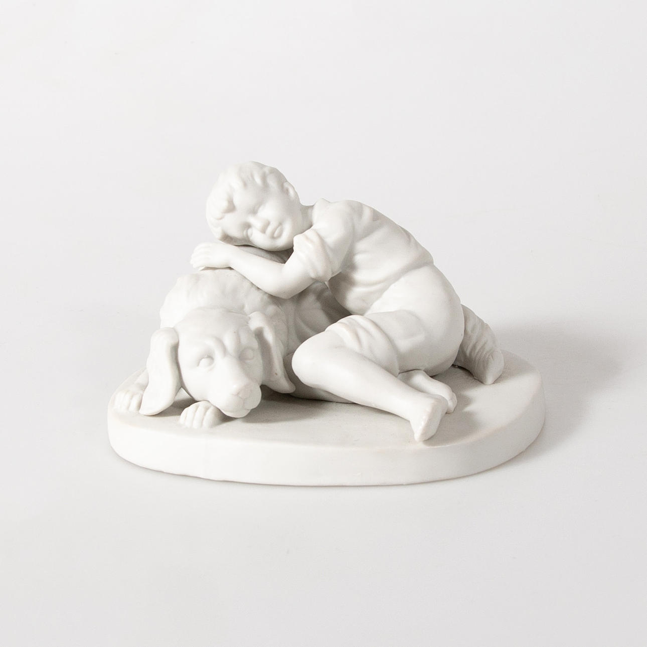 FIGURINE. Parian, Royal, boy with dog.