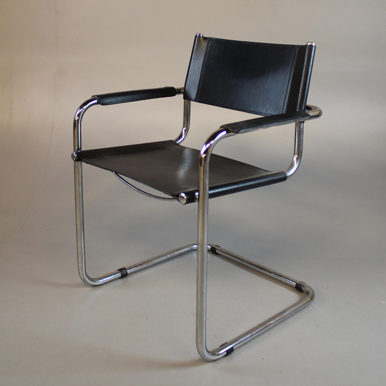 ARM CHAIR with chromed frame.
