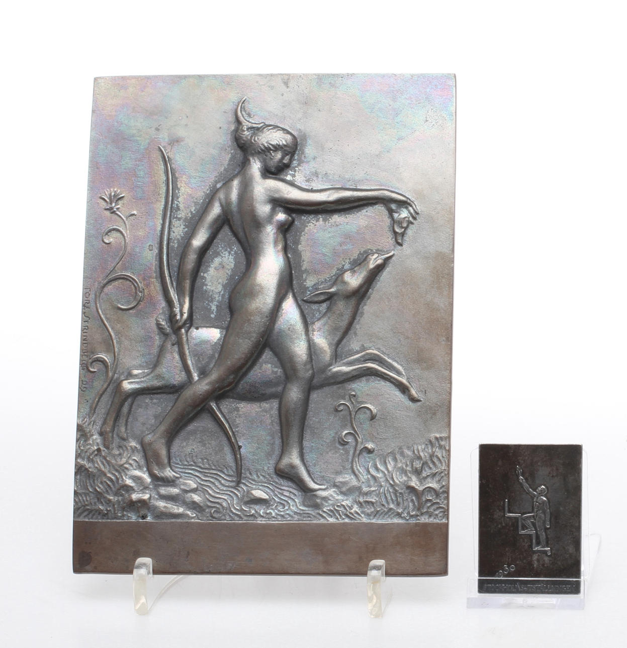 PLAKETTER, 2 st, silver respektive metall, Stockholmsutställningen 1930, Ivar Johnsson samt "Diana" Tore Strindberg -29.