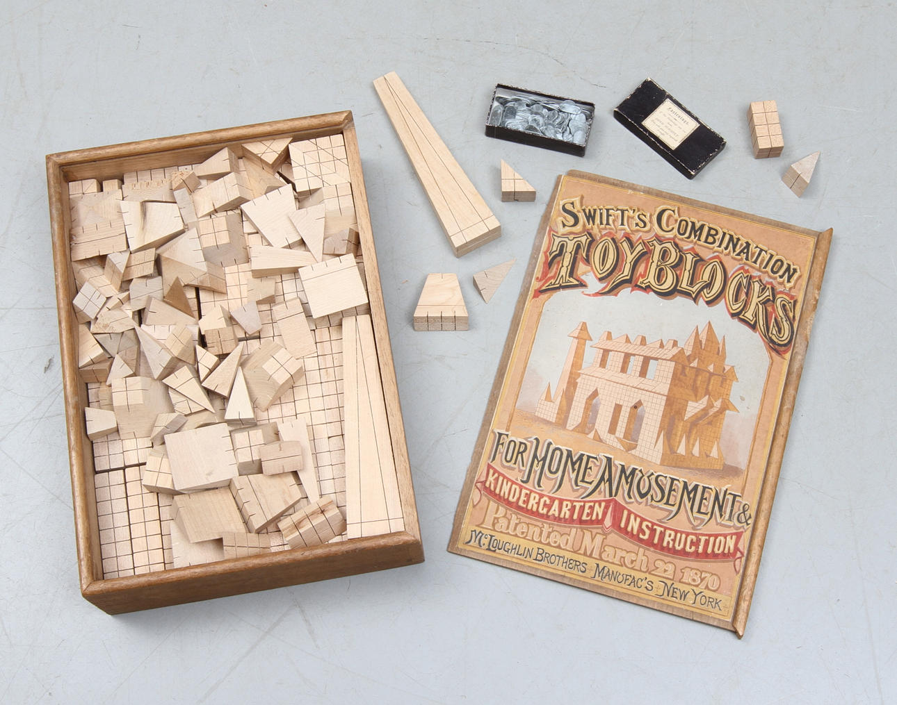 BYGGKLOSSAR, "Swift´s Combination Toyblocks" Patented March 22 1870, Mc Loughlin Brothers New York.