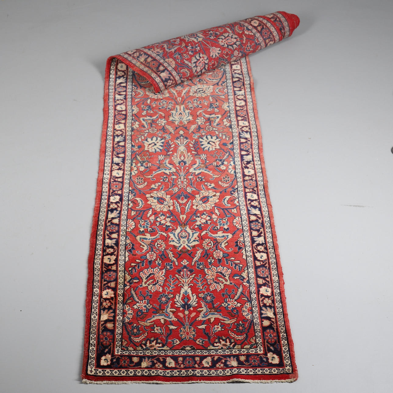 A TABRIZ RUNNER, 566 x 87 cm.