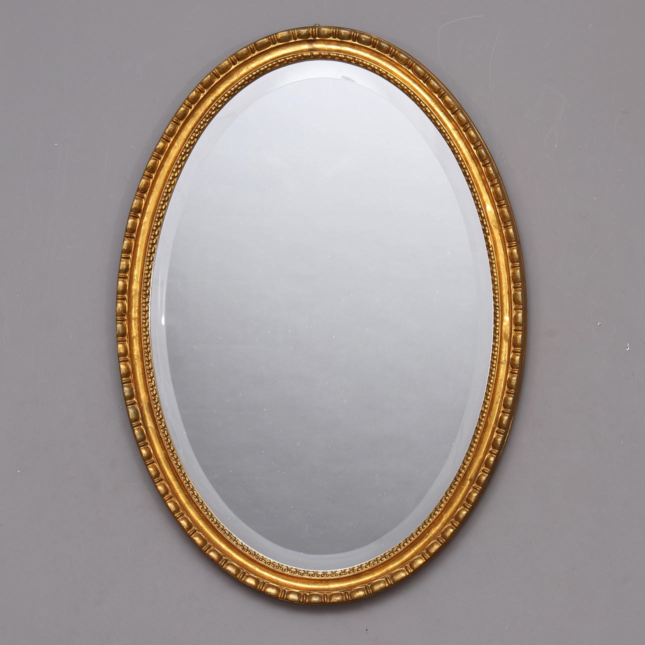 MIRROR, oval, gilded frame, late 20th century.
