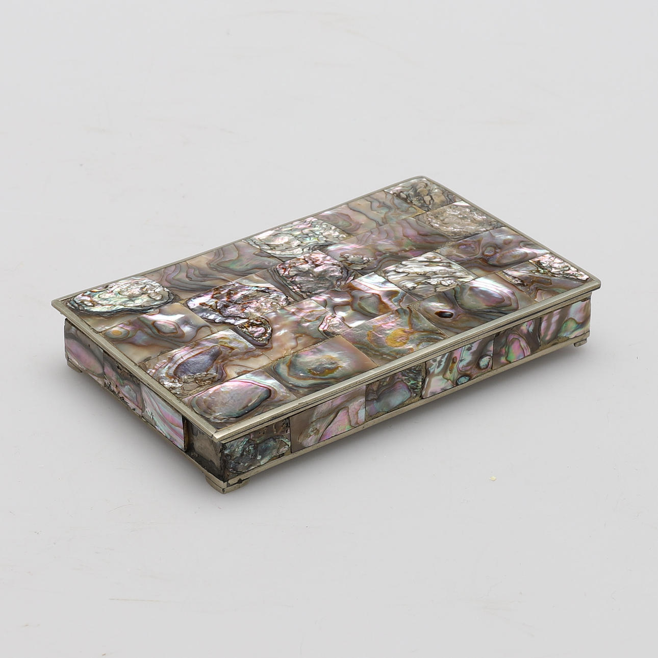 A MEXICAN ABALONE TRINKET BOX.