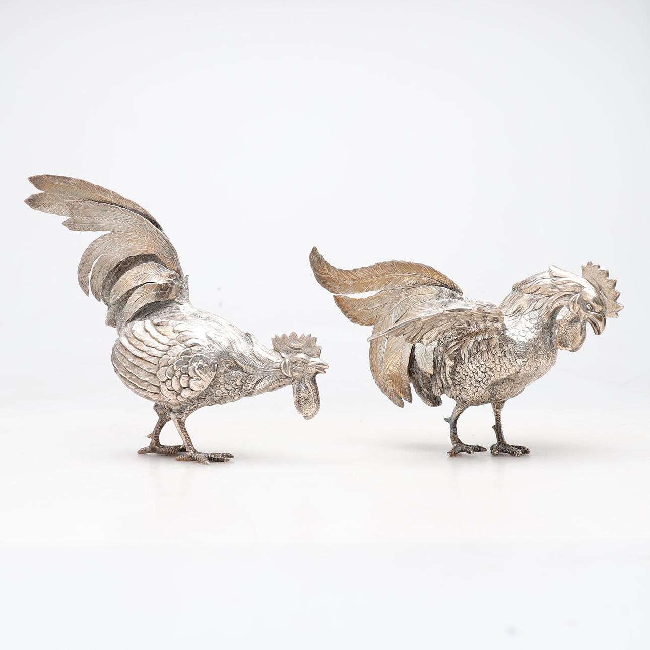 To sølvhaner, 20. århundrede.