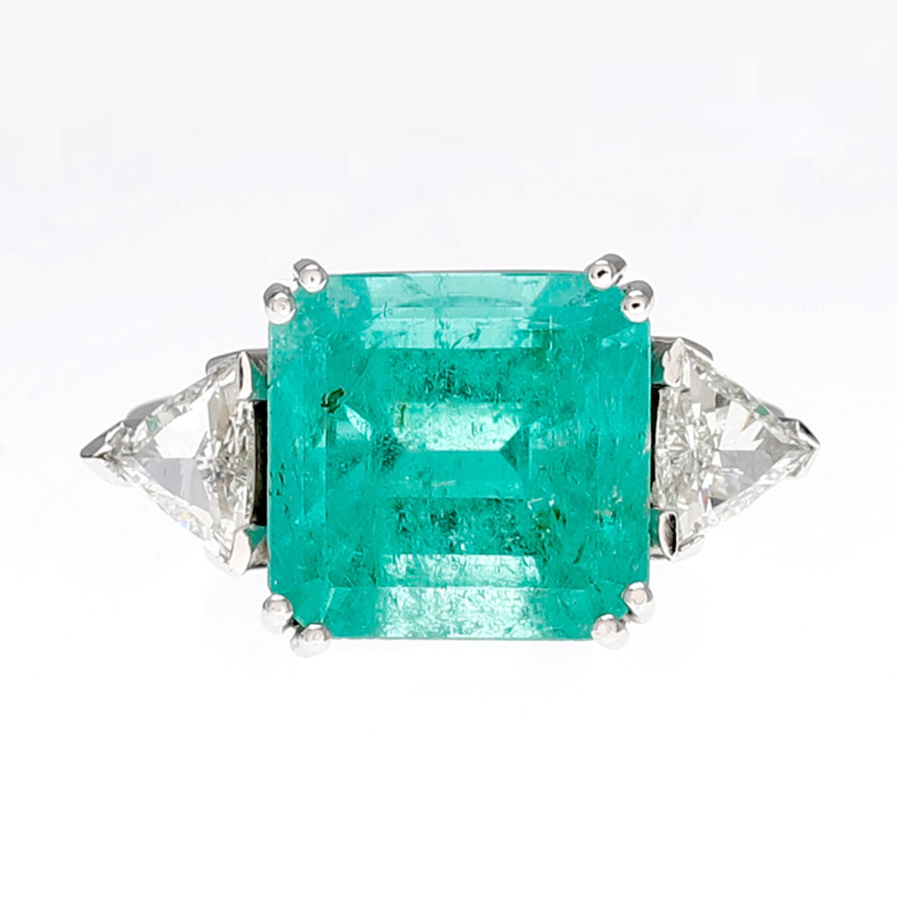 Emerald and diamond triplet ring.