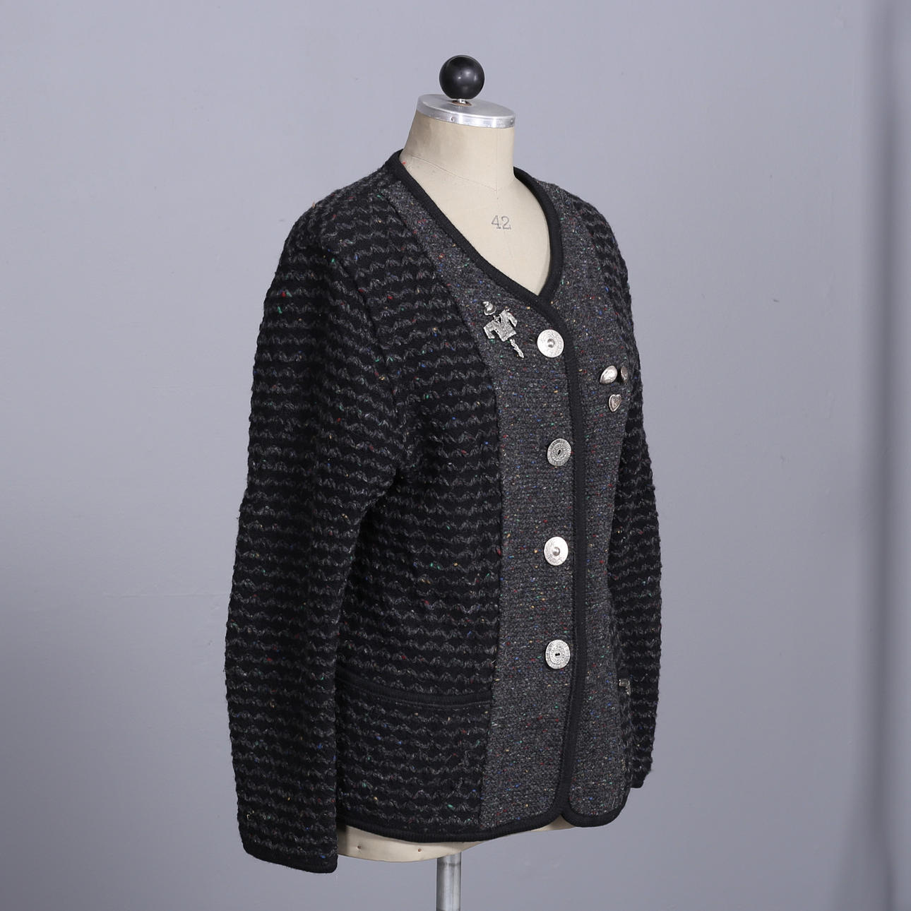 JACKET in knitted wool, labeled Stape, Made in Austria.