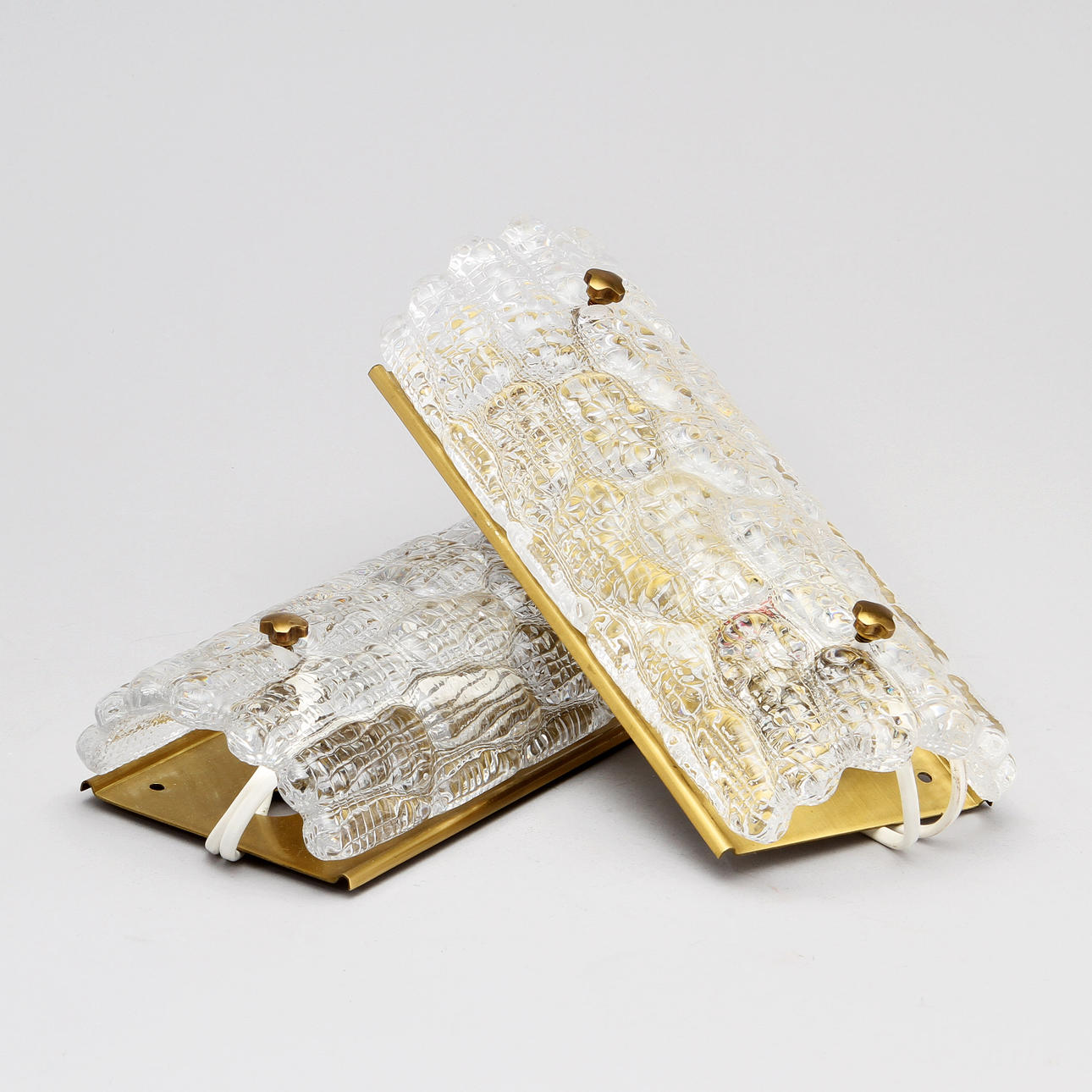 VÄGGLAMPETTER, ett par, glas, Carl Fagerlund, Orrefors.