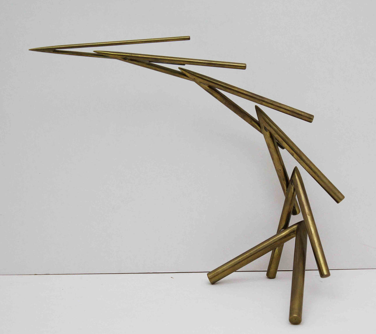 OSCAR REUTERSVÄRD. "Uppåtsträvande rörelse". Skulptur, mässing. Signerad.