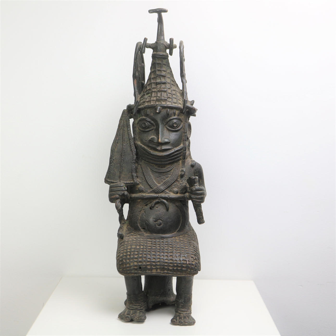BENIN BRONZE WARRIOR SCULPTURE.