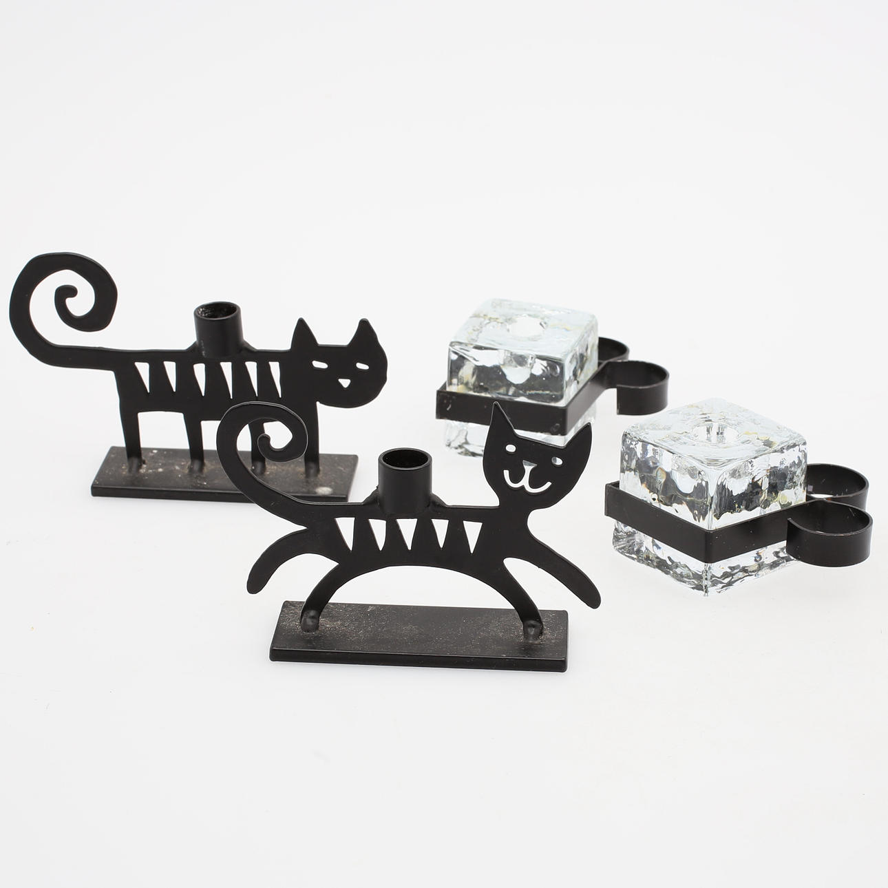 CANDLE STICKS, 4 pcs., metal, incl. a. Bengt & Lotta.