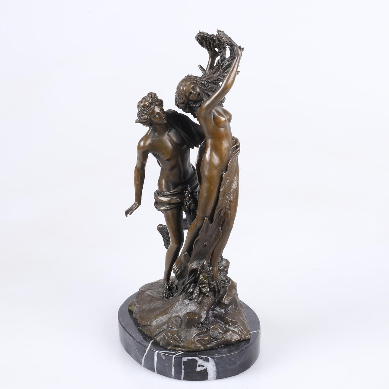 SKULPTUR, "Apollo und Daphne", patinierte Bronze.