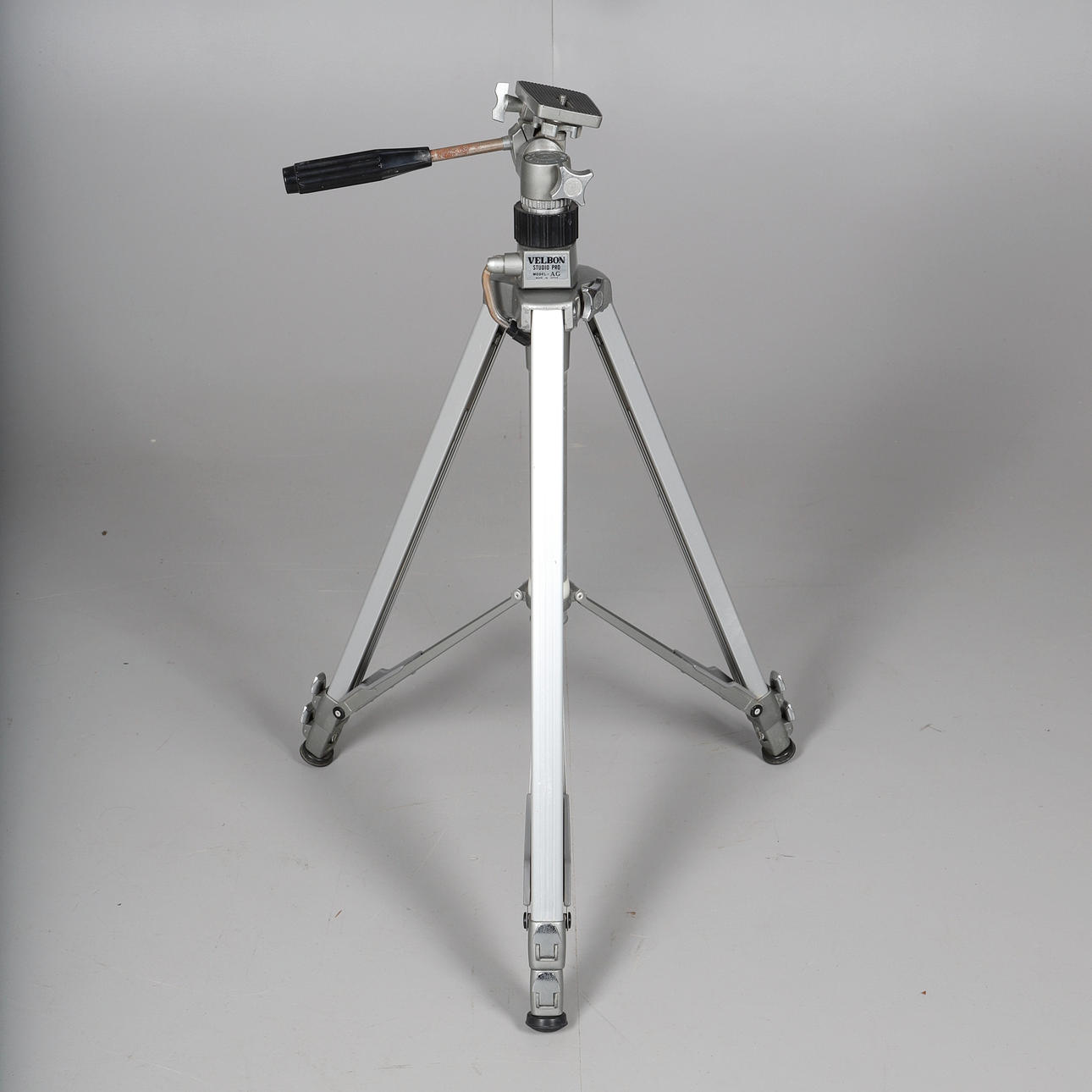A VINTAGE VELBON STUDIO PRO CAMERA TRIPOD.