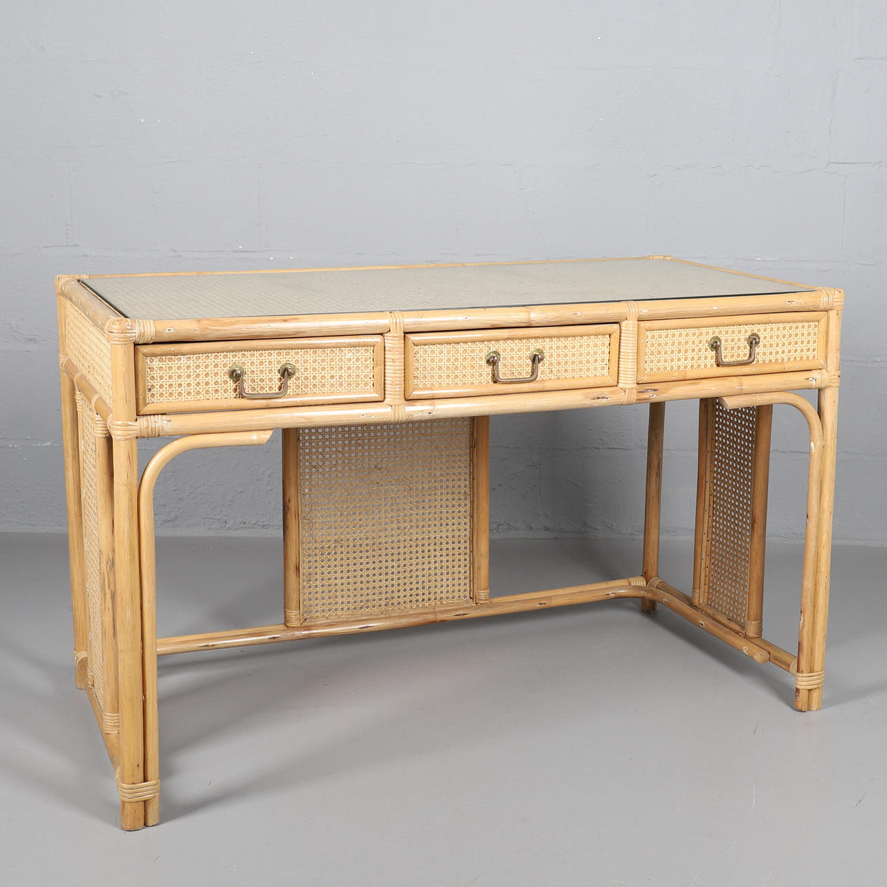A BAMBOO AND CANE DRESSING TABLE.