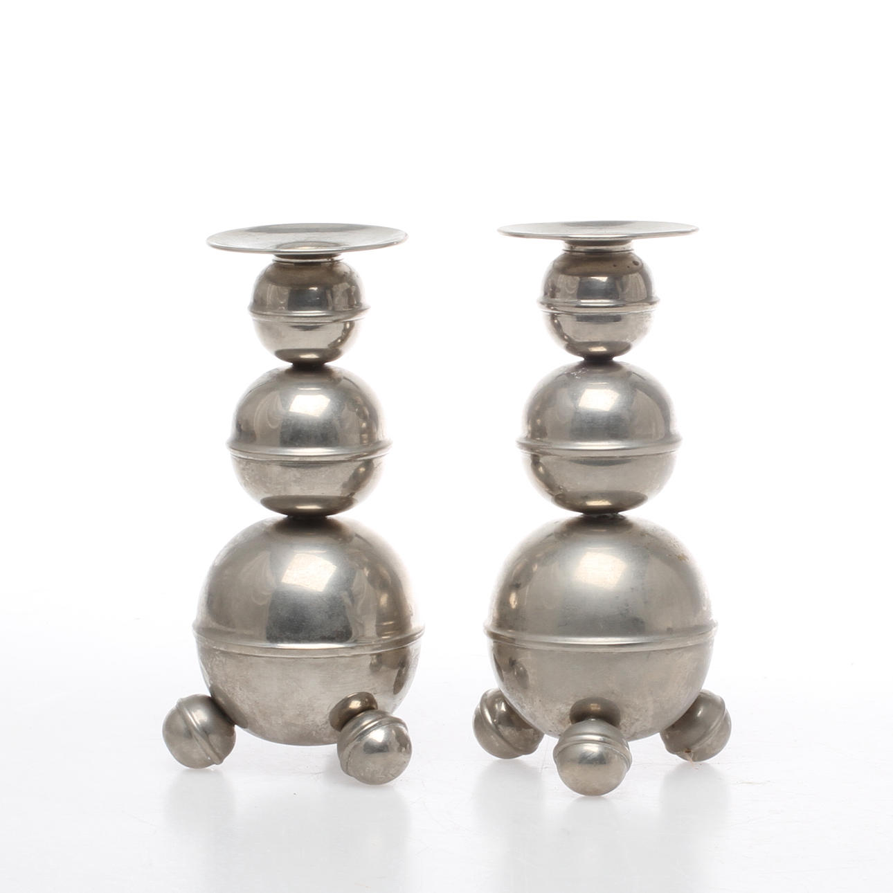 LJUSSTAKAR, ett par, 1900-talets första hälft.