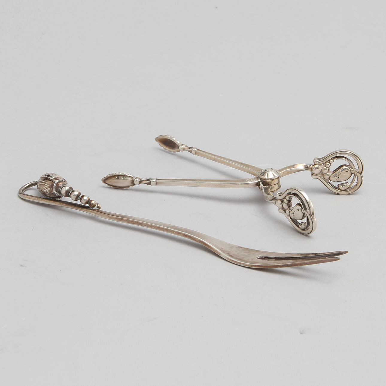 BESTICK "MAGNOLIA", sterlingsilver, 2 st. Georg Jensen, Köpenhamn. Vikt ca 41 gram.